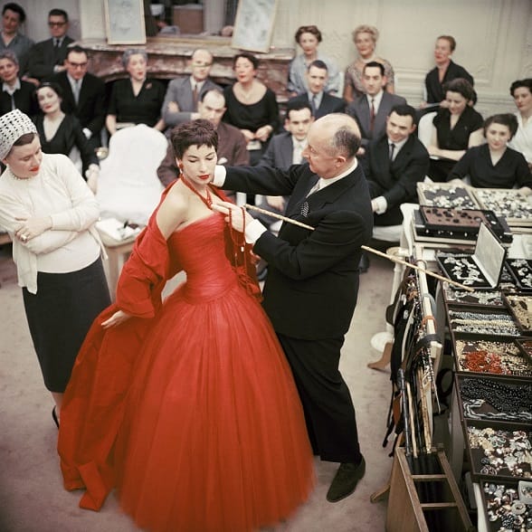 Christian Dior with fashion model Victoire wearing the "Zaire" dress (Autumn-Winter Haute Couture collection, H line) 1954 Â© 2013 Mark Shaw