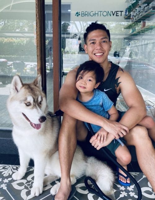 Qiu with his son Jude and family husky