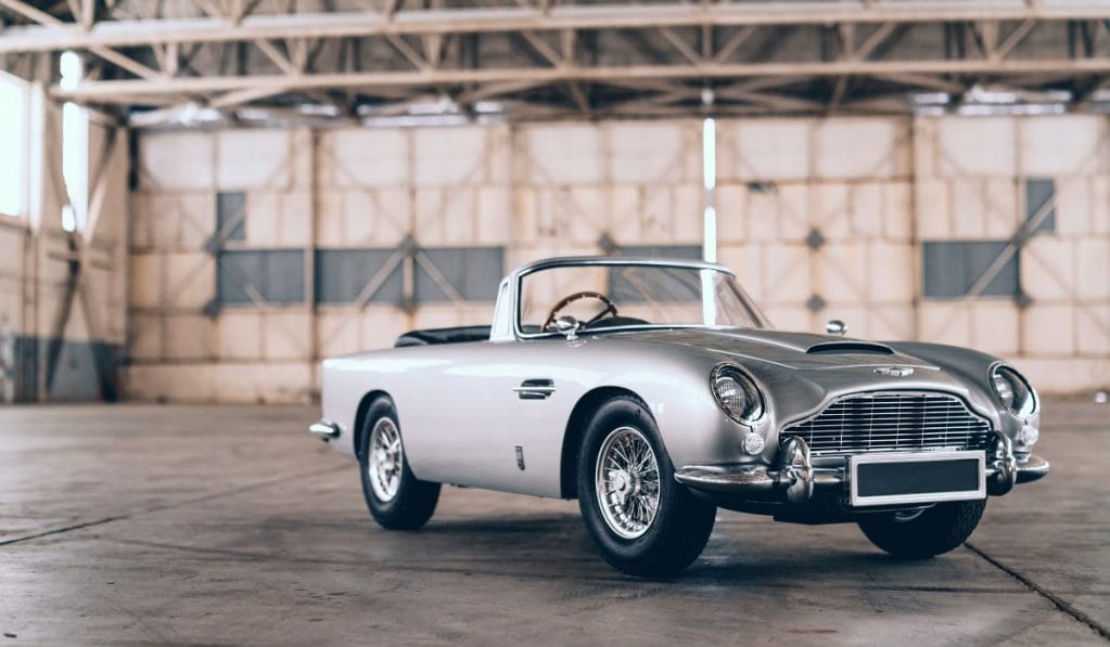 This Mini-Aston Martin DB5 Comes With a Suite of Working James Bond Gadgets